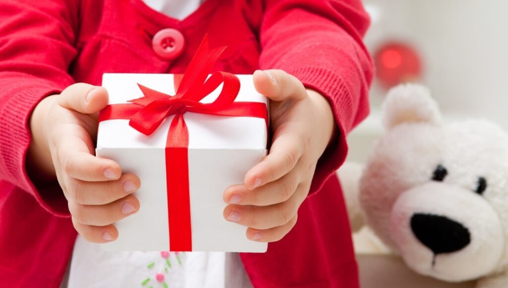 holding a present for her dad